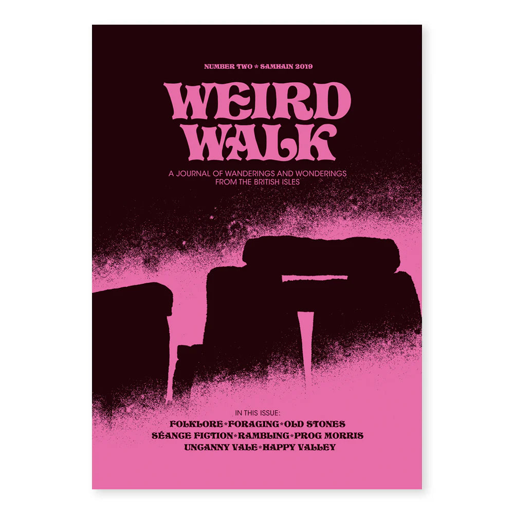 The cover of Weird Walk Zine Magazine Issue 2 showcases an illustration of Stonehenge in a pink and black color scheme, conjuring a sense of folk horror. Printed on recycled stock, this edition explores the mysteries and traditions surrounding Samhain.